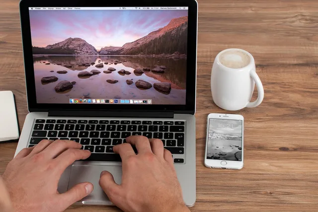 office, freelancer, computer, business, work, laptop, creative, iphone, macbook, apple inc, notebook, mobile, tablet, workplace, job, coffee, web, phone, coffee cup, technology, device, screen, typing, working, desk, cup, mug. London day rates compared with Manchester and Bristol freelance copywriting fees