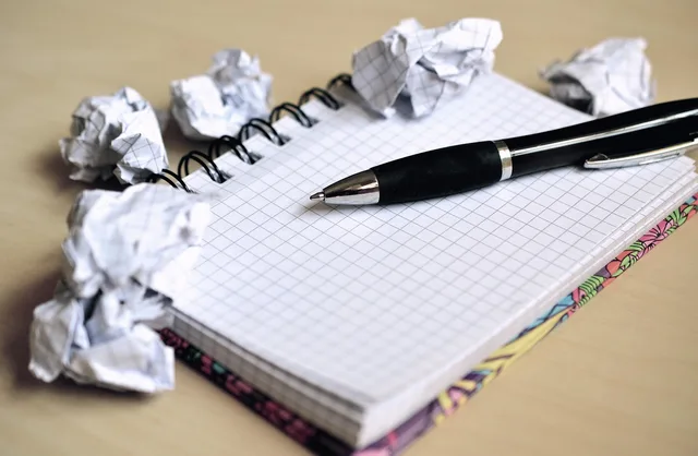 notes, notebook, paper, note, write down, pen, booklet, plan, ball of paper. What service standards mean for buying copywriting services