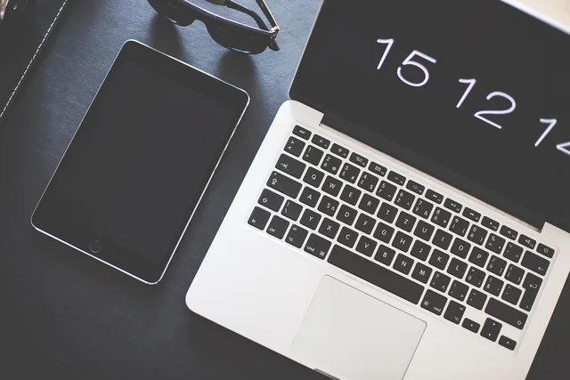 apple, computer, desk, electronics, gadgets, keyboard, laptop, macbook, screen, sunglasses, tablet, workspace, gray computer, gray laptop, gray apple, gray desk, gray keyboard, gray tablet. How to plan a UK copywriting services strategy before you write the brief